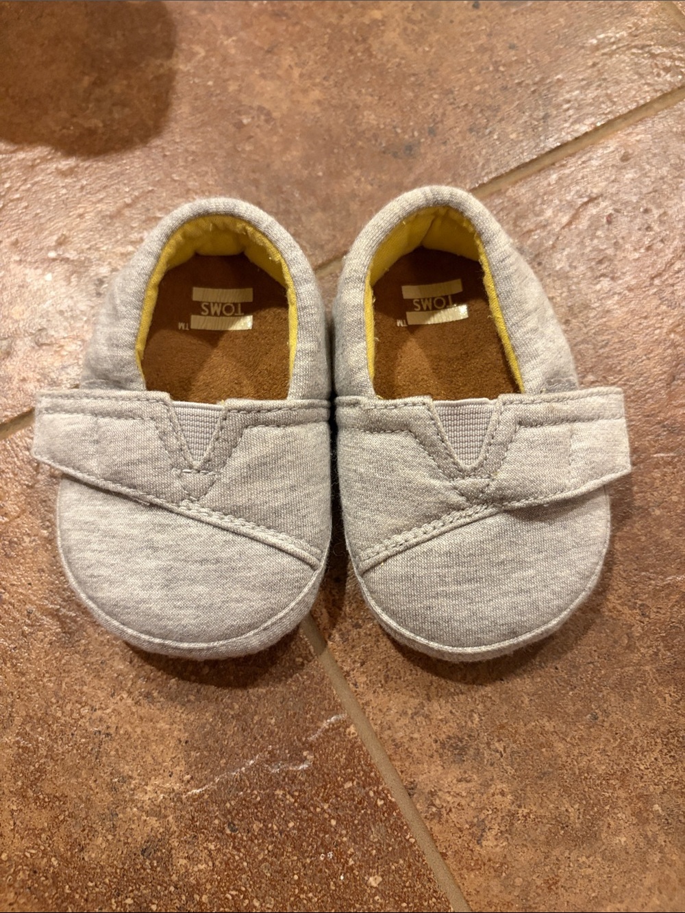 Toms Baby Gray Canvas Slip-On Shoes with Yellow Lining